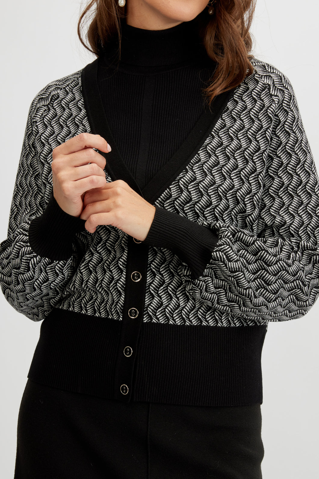 Cardigan knit sweater with black knit cuff