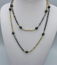 Load image into Gallery viewer, Hematite Beads on long gold &amp; black chain

