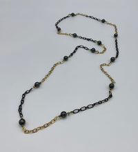 Load image into Gallery viewer, Hematite Beads on long gold &amp; black chain
