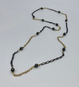 Hematite Beads on long gold & black chain
